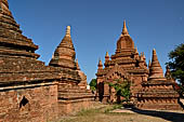 The cluster of red brick temples, named Khay-min-gha on the map on the North plain of Bagan. Myanmar. 